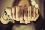 patience tattoo on fingers